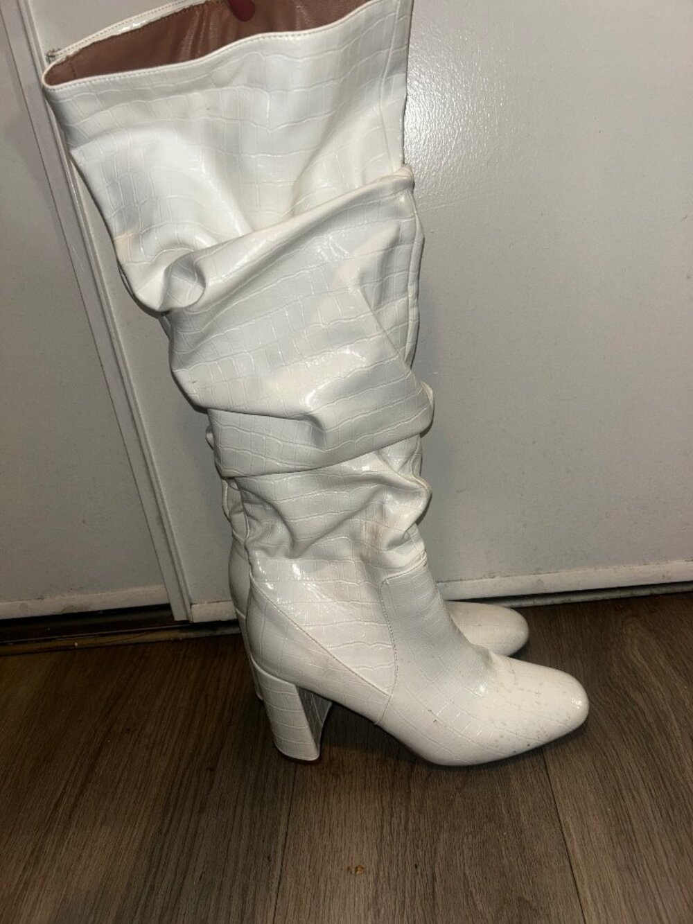 White knee high boots